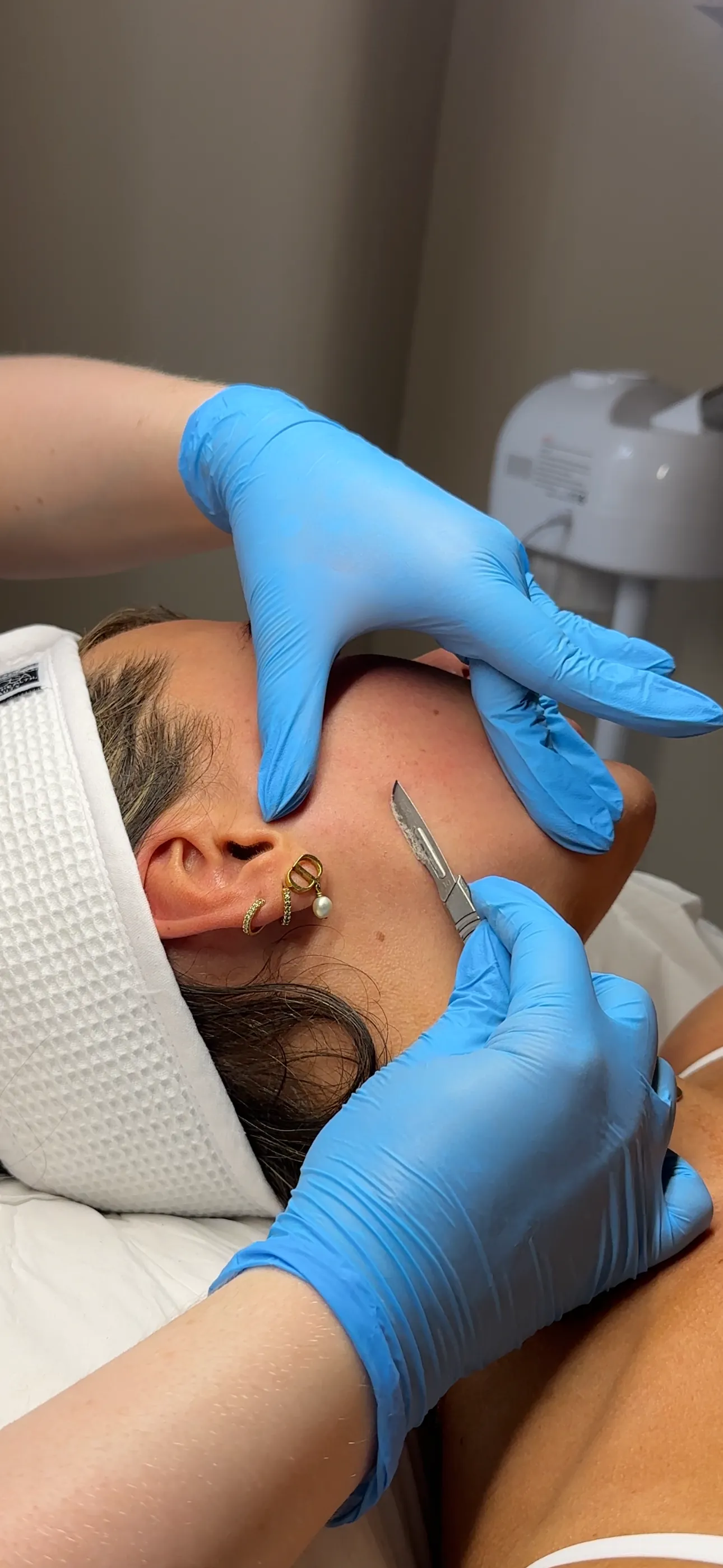 Dermaplaning Facial treatment session